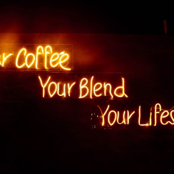 Warm white neon-style lettering for a cafe